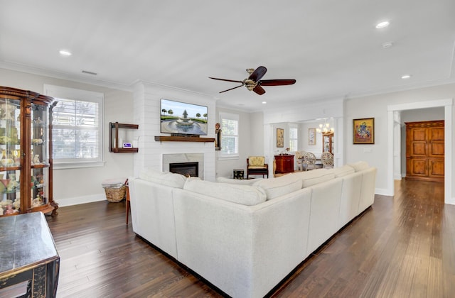 828 Bridge Point Cir, Mount Pleasant, SC 29464 - living area with ornamental molding, a ceiling fan, a fireplace, dark wood finished floors, and baseboards
