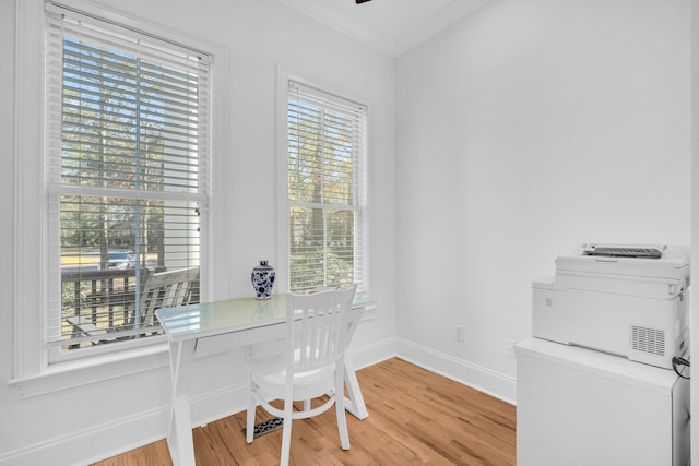 office area with crown molding and hardwood / wood-style floors