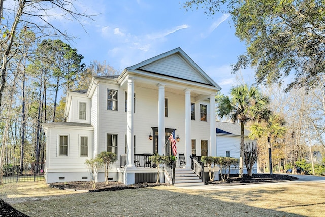 greek revival house with covered porch