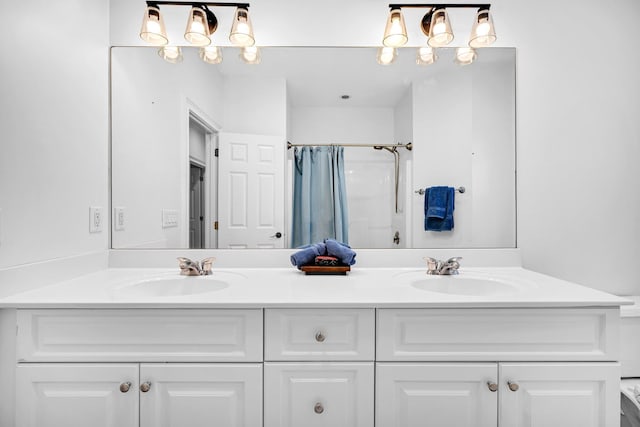 bathroom with vanity and a shower with curtain