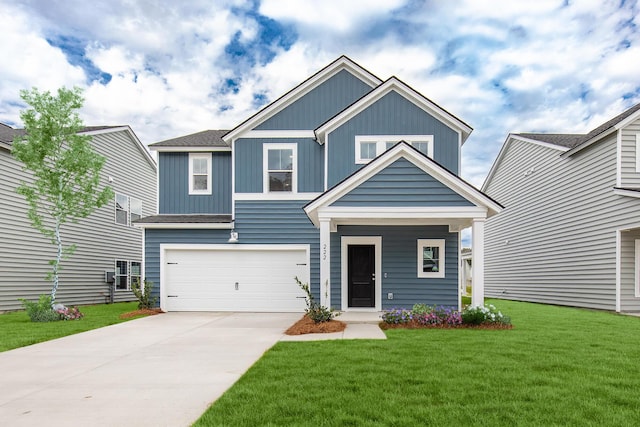 craftsman-style house with a garage and a front lawn