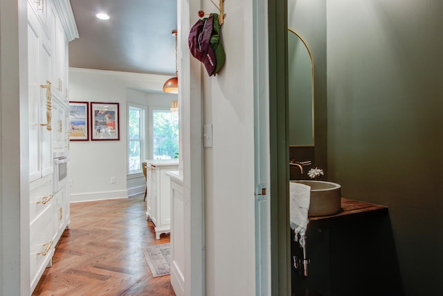 1081 Groves Manor Ct, Mount Pleasant, SC 29464 - hall featuring recessed lighting, baseboards, a sink, and ornamental molding