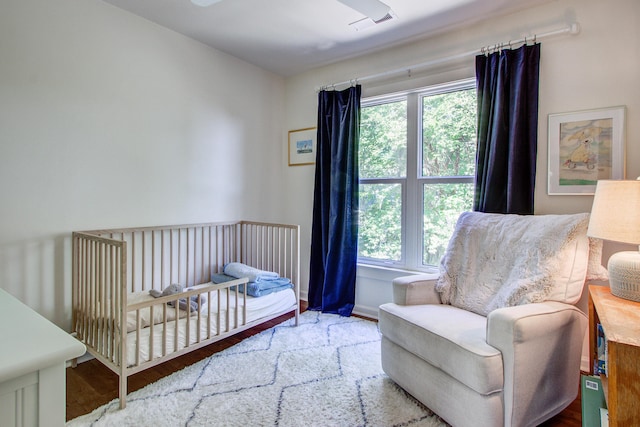 1081 Groves Manor Ct, Mount Pleasant, SC 29464 - bedroom with multiple windows, wood finished floors, and baseboards