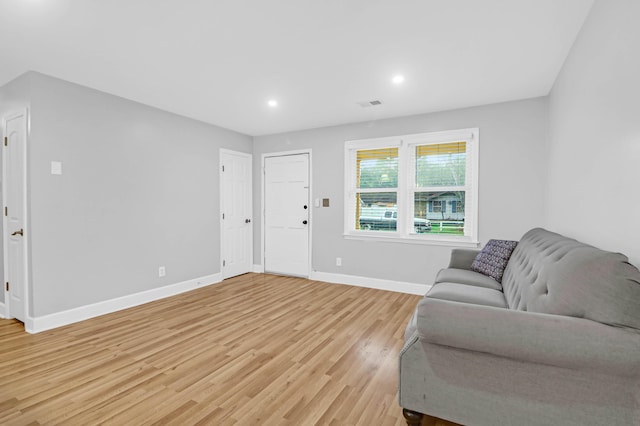 1873 Hazelwood Dr, Charleston, SC 29407 - living room with light wood-style flooring, visible vents, baseboards, and recessed lighting