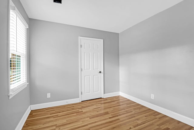 1873 Hazelwood Dr, Charleston, SC 29407 - empty room with baseboards and wood finished floors