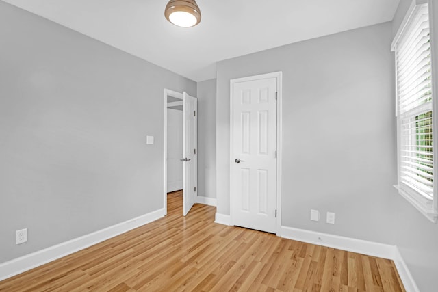 1873 Hazelwood Dr, Charleston, SC 29407 - unfurnished bedroom featuring baseboards and light wood finished floors