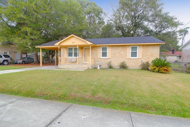 1873 Hazelwood Dr, Charleston, SC 29407 - ranch-style home with a front lawn, a carport, brick siding, and concrete driveway
