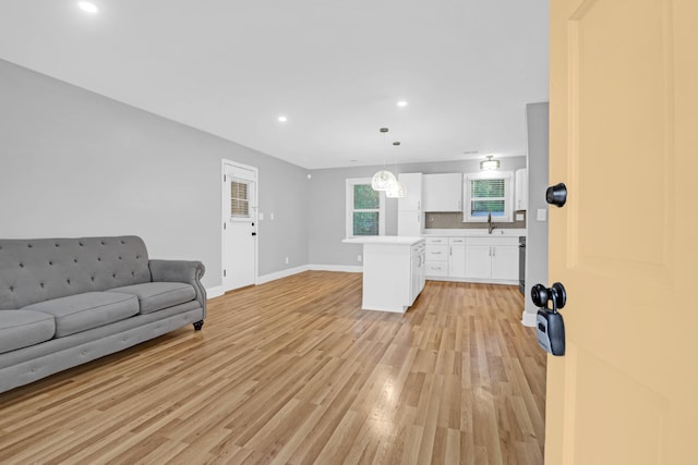 1873 Hazelwood Dr, Charleston, SC 29407 - living area with baseboards, light wood-style flooring, and recessed lighting