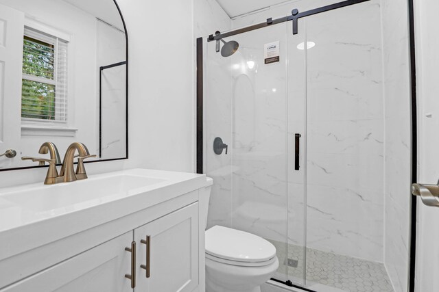 1873 Hazelwood Dr, Charleston, SC 29407 - bathroom featuring a marble finish shower, toilet, and vanity