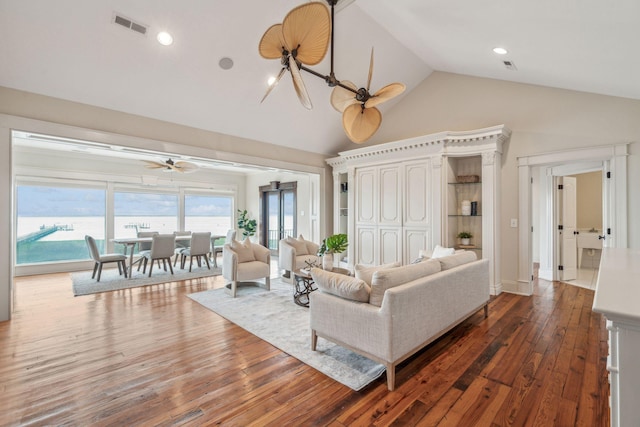 104 Beach St, Mount Pleasant, SC 29464 - living area with a ceiling fan, wood-type flooring, and high vaulted ceiling