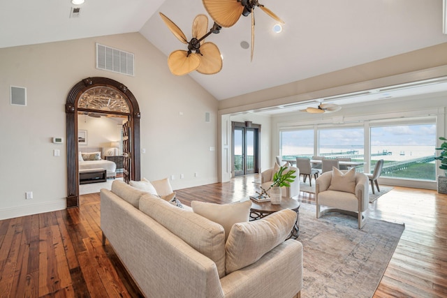 104 Beach St, Mount Pleasant, SC 29464 - living area with a ceiling fan, wood finished floors, high vaulted ceiling, and baseboards