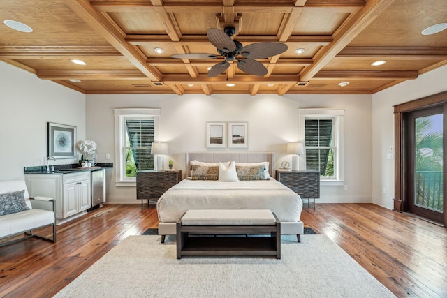 104 Beach St, Mount Pleasant, SC 29464 - bedroom featuring wood ceiling with exposed beams, hardwood / wood-style flooring, coffered ceiling, baseboards, and fridge