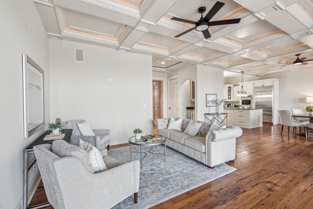 104 Beach St, Mount Pleasant, SC 29464 - living area featuring a ceiling fan, dark wood-type flooring, arched walkways, beam ceiling, and coffered ceiling