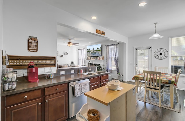 kitchen with ceiling fan, dark wood-style flooring, recessed lighting, stainless steel dishwasher, and a sink