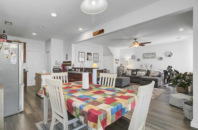 dining room featuring dark wood finished floors, recessed lighting, and ceiling fan