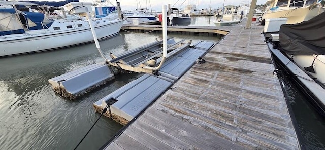 WE 10th St Unit B11, Folly Beach, SC 29439 - dock area with a water view and view of marina