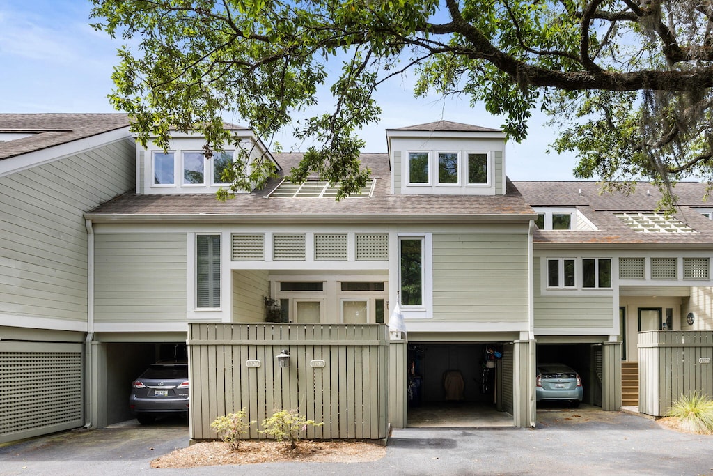 view of front of home featuring a carport