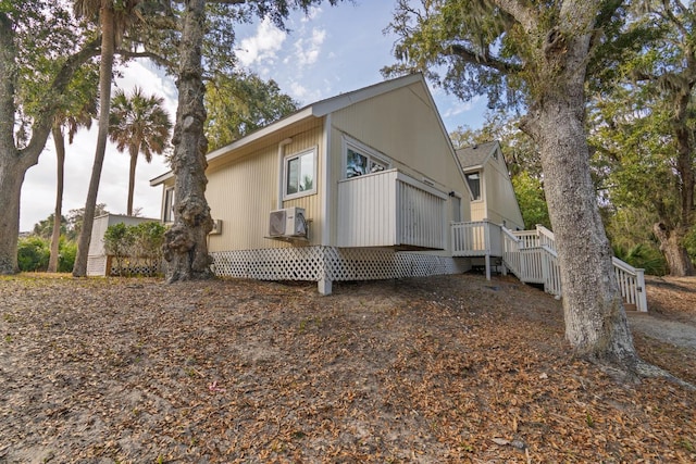 view of side of property featuring a deck