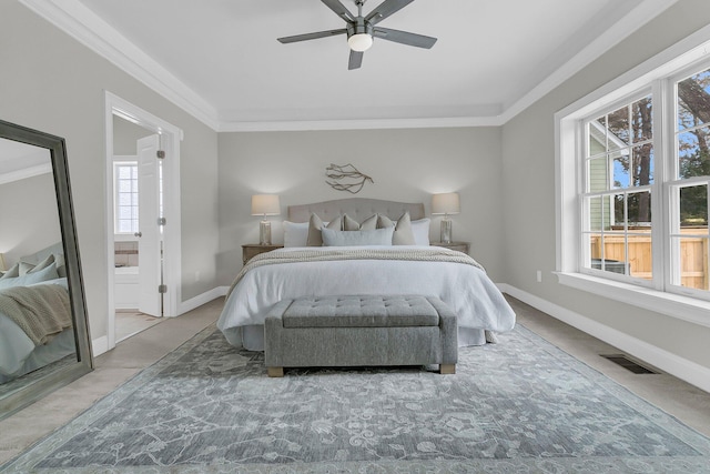 carpeted bedroom featuring multiple windows, ornamental molding, and ceiling fan