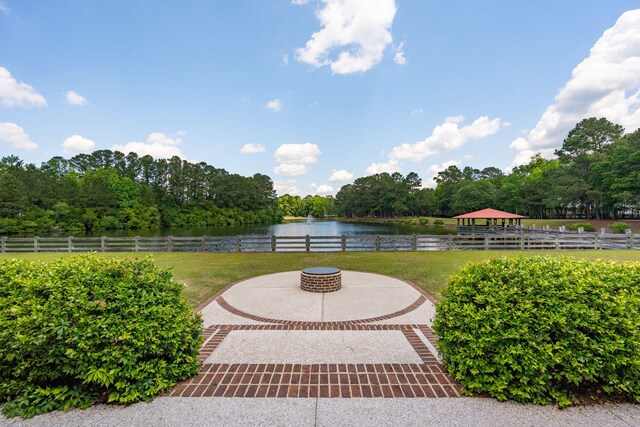 view of patio featuring a water view