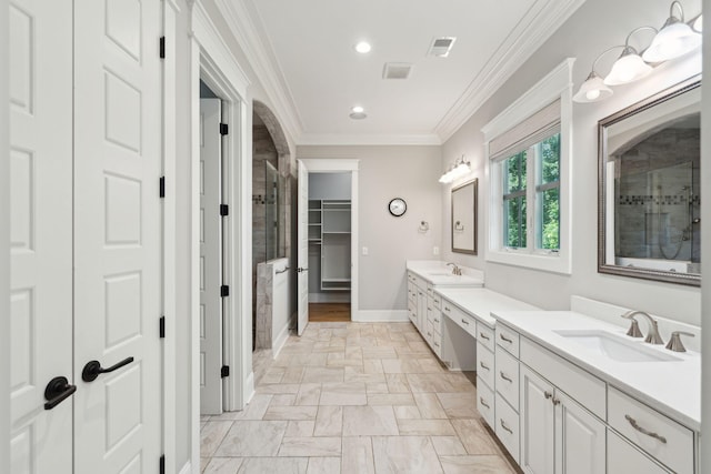 full bathroom with a shower stall, vanity, crown molding, recessed lighting, and baseboards