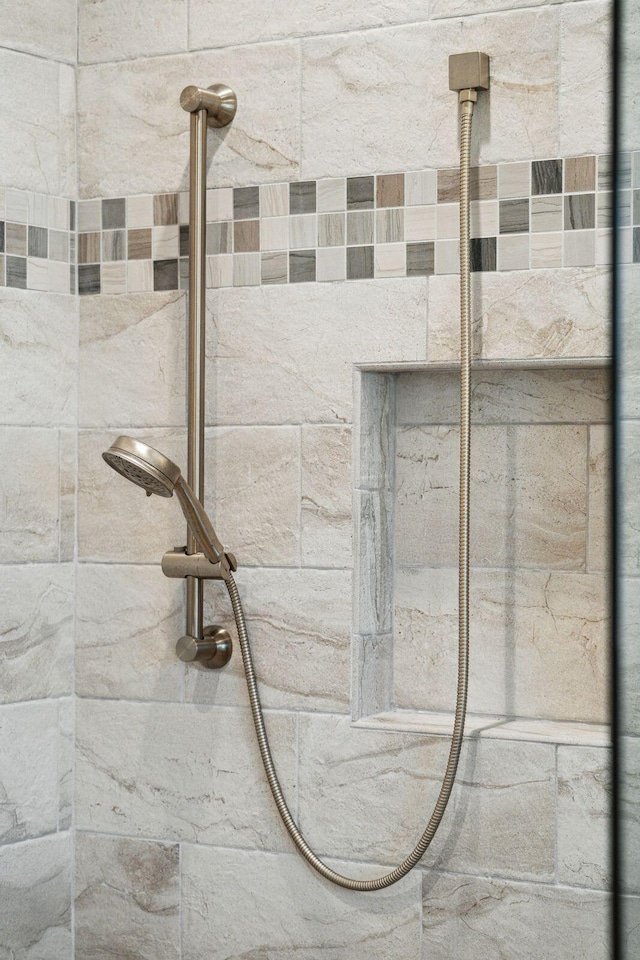 bathroom view of a tile shower