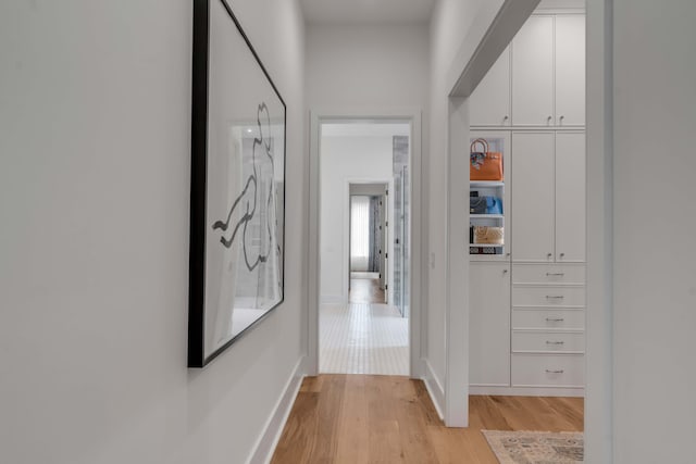 hallway featuring light wood-type flooring