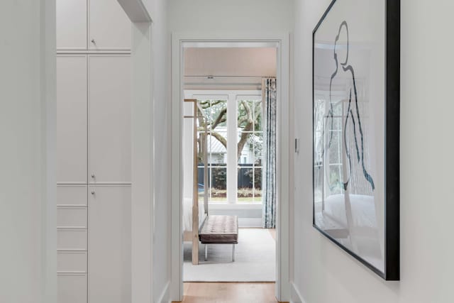 hallway featuring light hardwood / wood-style flooring