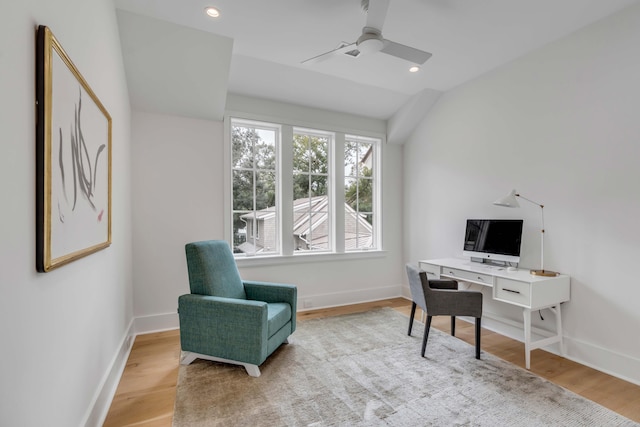 office area with light hardwood / wood-style floors and ceiling fan