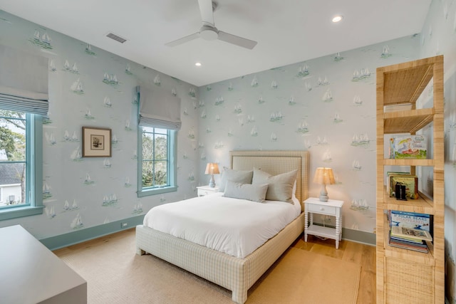 bedroom featuring ceiling fan and light wood-type flooring