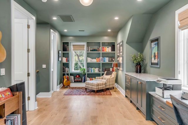 living area featuring light hardwood / wood-style flooring