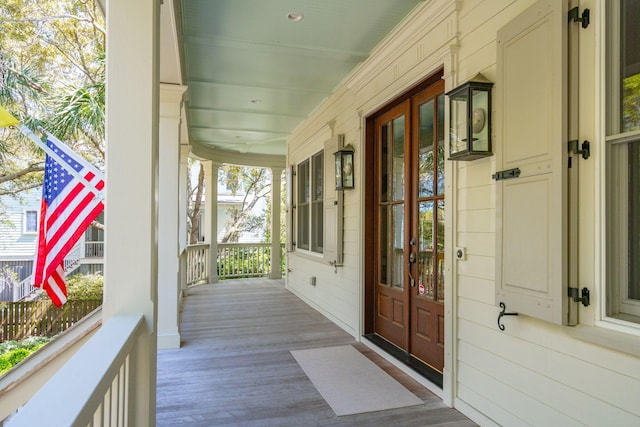 doorway to property featuring covered porch