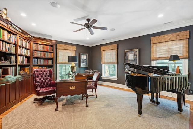 living area with recessed lighting, visible vents, crown molding, and wood finished floors