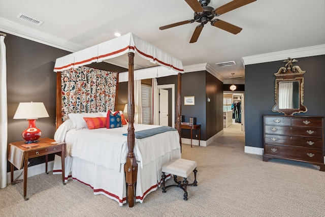 carpeted bedroom with ornamental molding, visible vents, and baseboards