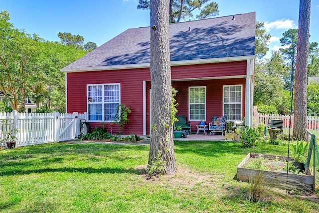 8965 N Red Maple Cir, Summerville, SC 29485 - rear view of property with a garden, roof with shingles, and a gate