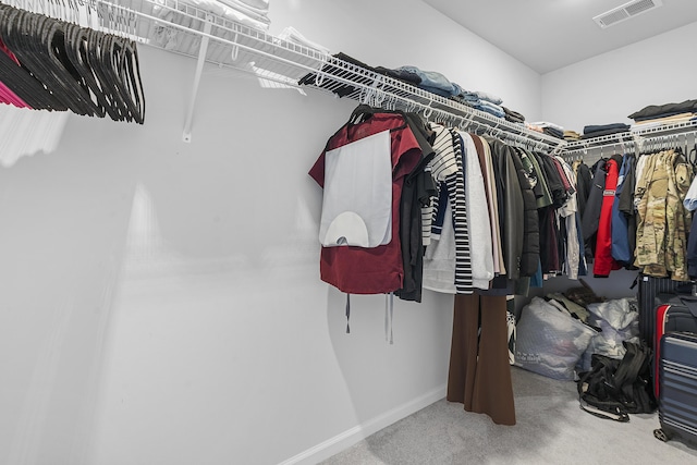 walk in closet with carpet and visible vents