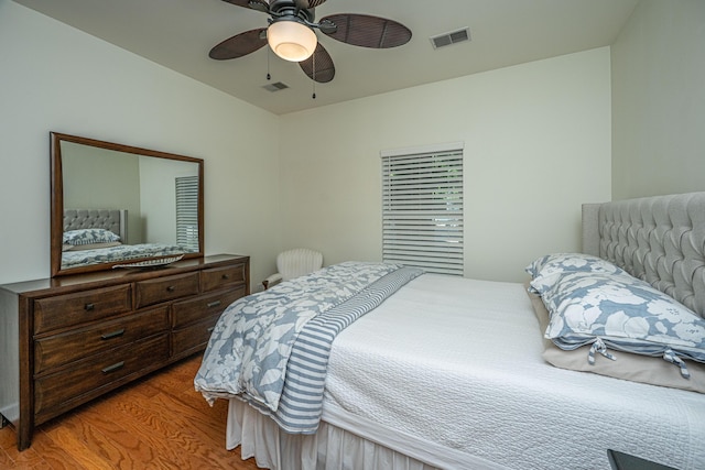 401 S Elgin Ct Unit 401, Charleston, SC 29414 - bedroom with wood finished floors and a ceiling fan