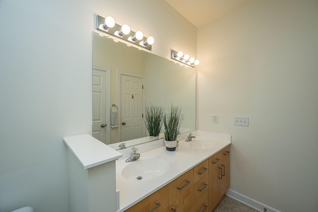 401 S Elgin Ct Unit 401, Charleston, SC 29414 - bathroom featuring double vanity, baseboards, and tile patterned flooring