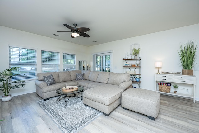 401 S Elgin Ct Unit 401, Charleston, SC 29414 - living area with a ceiling fan, wood finished floors, and baseboards