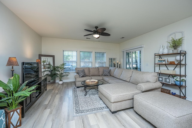 401 S Elgin Ct Unit 401, Charleston, SC 29414 - living area featuring a ceiling fan, light wood finished floors, and baseboards