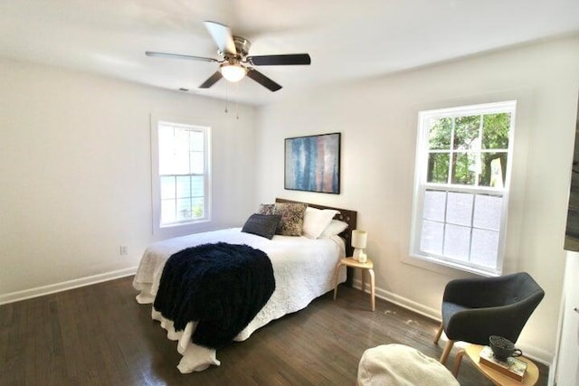 bedroom featuring dark hardwood / wood-style flooring and ceiling fan