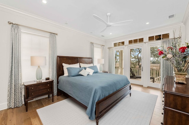 bedroom with visible vents, light wood-style flooring, recessed lighting, ornamental molding, and access to outside