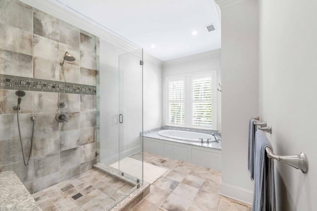 bathroom featuring visible vents, crown molding, baseboards, a garden tub, and a stall shower