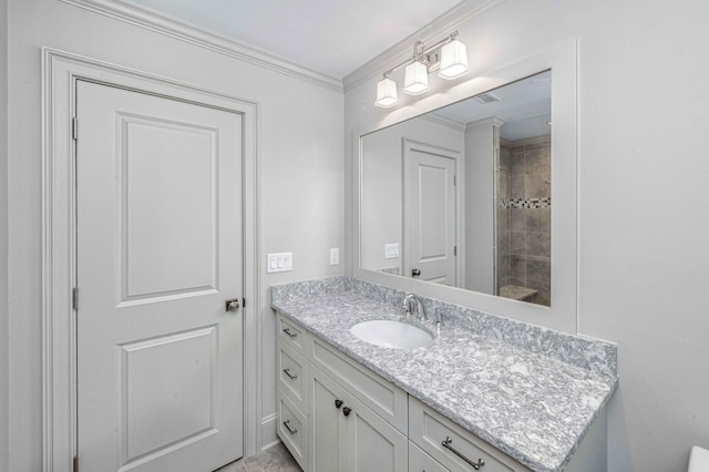 bathroom featuring vanity and crown molding