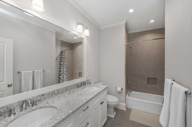 full bath with tile patterned flooring, ornamental molding, toilet, and a sink