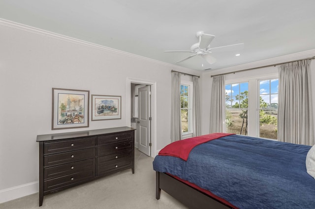 bedroom featuring ceiling fan, crown molding, baseboards, and light carpet