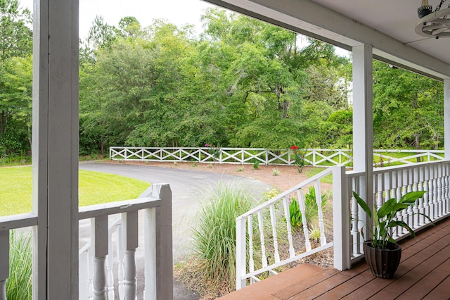 225 Baxter Ln, Walterboro, SC 29488 - deck with ceiling fan and view of scattered trees