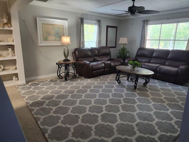 225 Baxter Ln, Walterboro, SC 29488 - living area featuring a ceiling fan, baseboards, and built in shelves