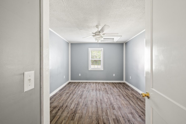 225 Baxter Ln, Walterboro, SC 29488 - empty room with wood finished floors, ornamental molding, ceiling fan, a textured ceiling, and baseboards
