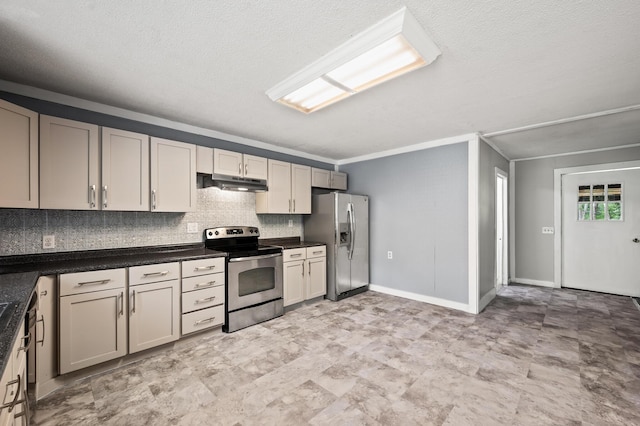 225 Baxter Ln, Walterboro, SC 29488 - kitchen with stainless steel appliances, under cabinet range hood, backsplash, dark countertops, and a textured ceiling
